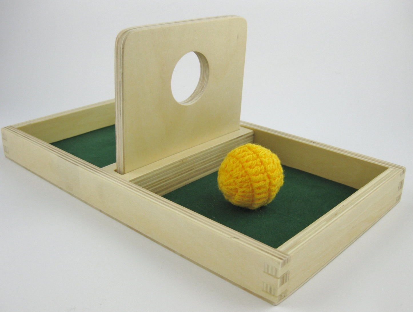 Imbucare board with knit ball