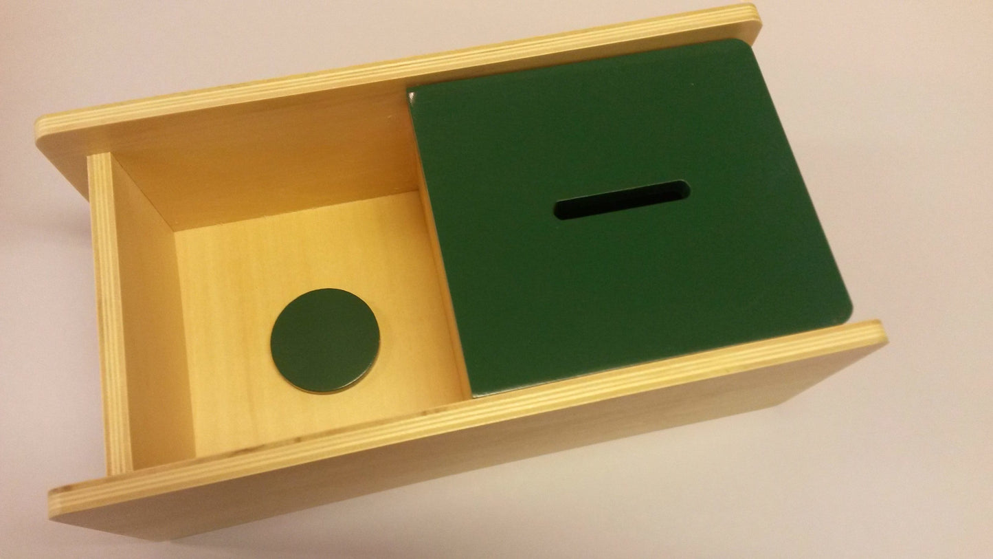 Plocka-i-låda med vipplock och en grön cirkelplatta