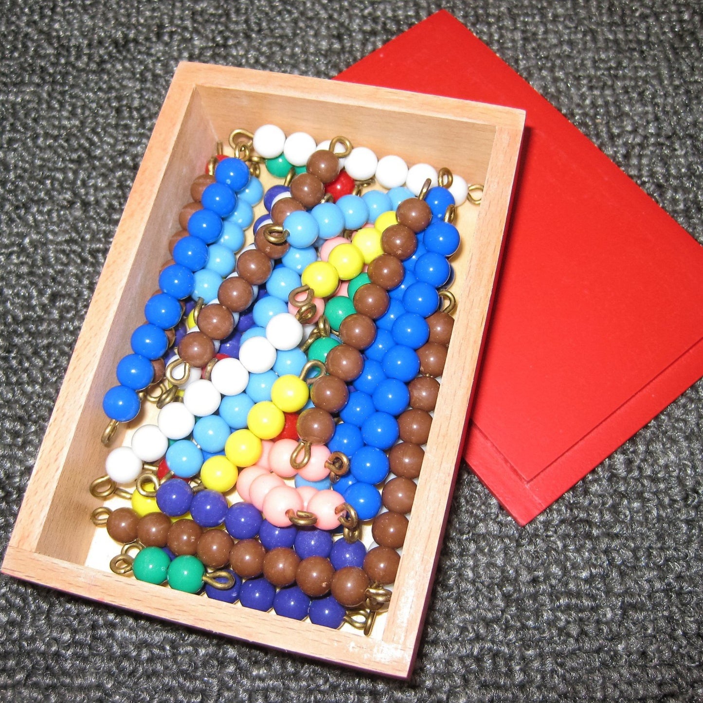 Pärltrappan 1-9 färgade rörliga pärlor med låda